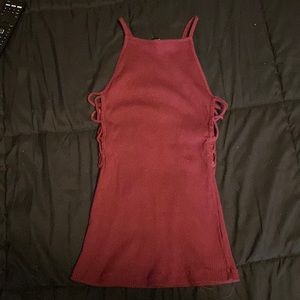 Ambiance fitted maroon shirt size small, the sides have crossly opens